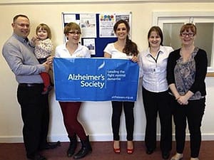Jemma, Jon and a very small Yasmin support their local Alzheimer's Society branch